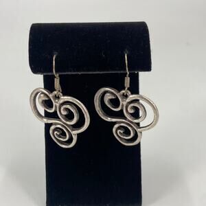 Silver tone swirl trinity earrings